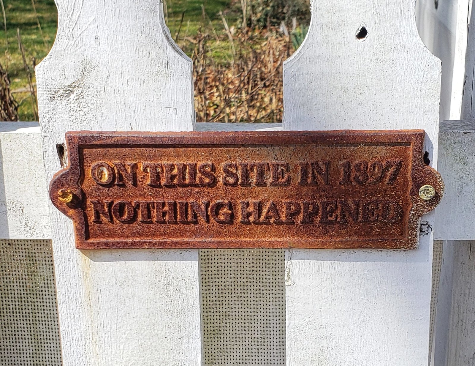 random sign on a fence in Mystic, CT