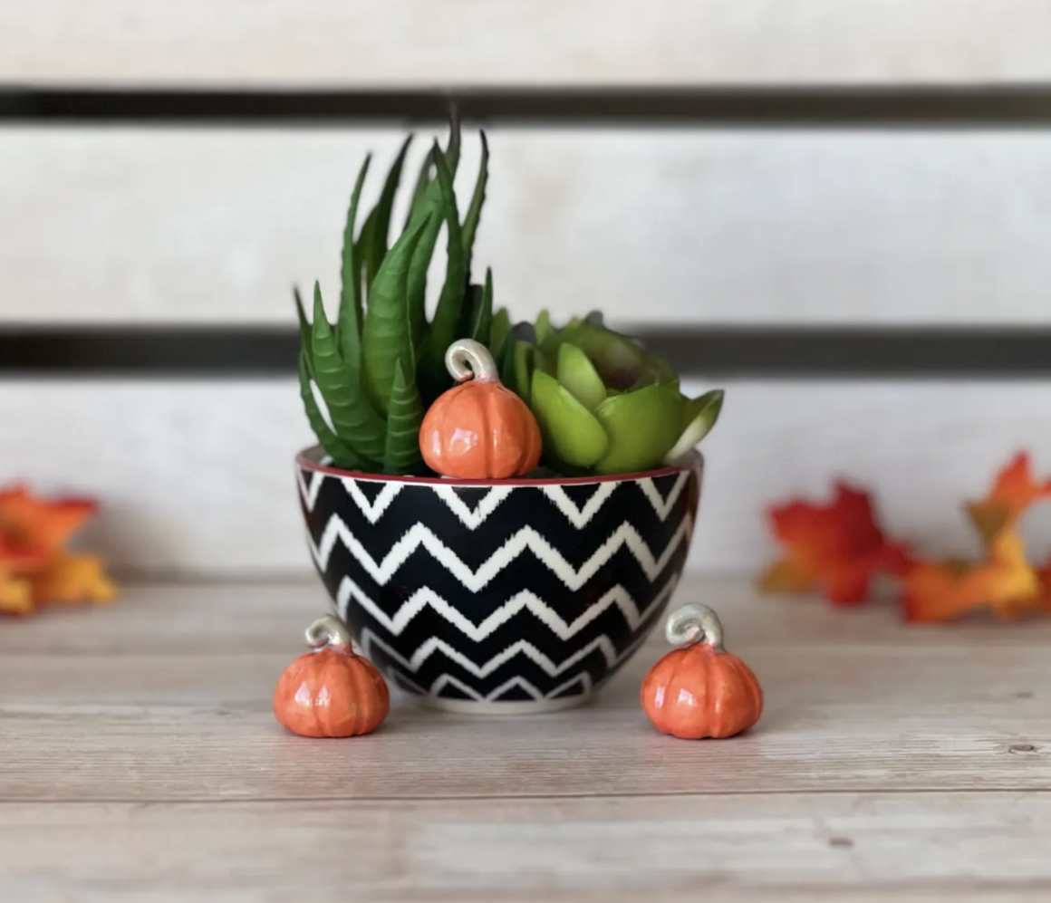 tiny ceramic pumpkins by AmberleByrne