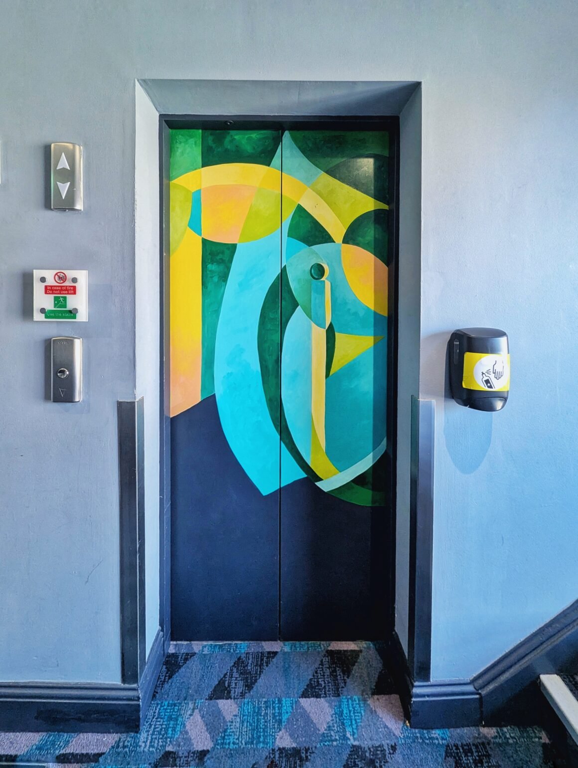 colorful elevator doors at Arthaus Dublin