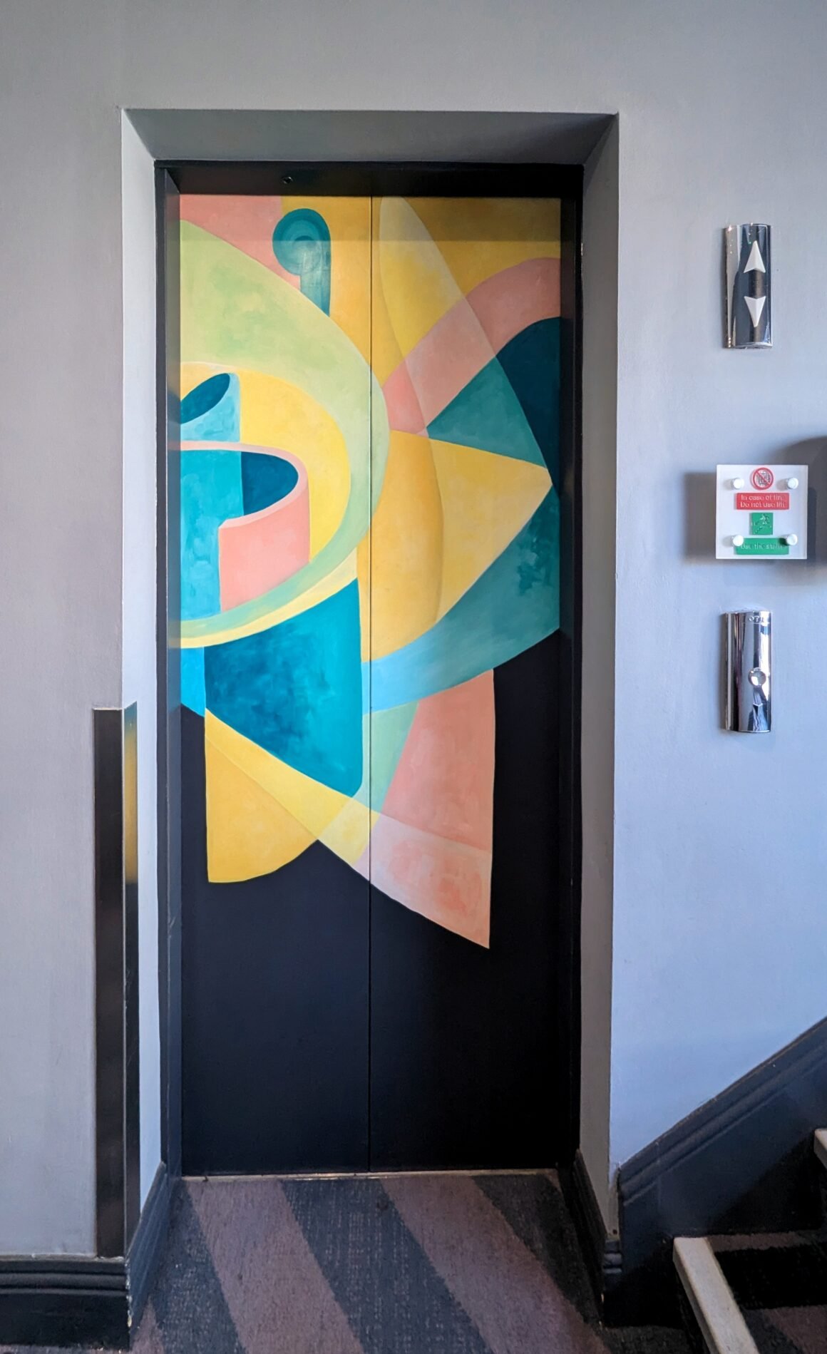 colorful elevator doors at Arthaus Dublin